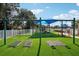Well-maintained community playground with swings and slide, perfect for Gathering fun at 1919 Oswego Dr, Holiday, FL 34691