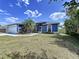 Charming single-Gathering home showcasing a well-maintained lawn and inviting curb appeal at 21626 Rosewood Ct, Lutz, FL 33549