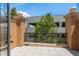 This balcony offers tiled flooring, black metal railings, and exterior views of a tree at 2221 Soho Bay Ct, Tampa, FL 33606