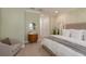 Cozy bedroom featuring neutral tones, soft lighting, and closet with sliding doors at 2221 Soho Bay Ct, Tampa, FL 33606