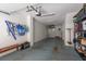 This spacious garage has ample storage and a workbench area for projects at 2221 Soho Bay Ct, Tampa, FL 33606