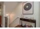 Hallway with staircase, table, and decor at 2221 Soho Bay Ct, Tampa, FL 33606