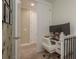Functional home office with white desk, dual monitors, and ample natural light at 2221 Soho Bay Ct, Tampa, FL 33606
