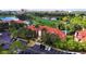 Beautiful aerial view featuring the building, parking area, and golf course in the background at 2400 Feather Sound Dr # 635, Clearwater, FL 33762