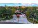 Welcoming entrance to the gated community, surrounded by mature trees and manicured landscaping at 2400 Feather Sound Dr # 635, Clearwater, FL 33762
