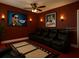 Home theater with reclining seating, a large screen, and dim lighting offering the ultimate movie-watching experience at 2400 Feather Sound Dr # 635, Clearwater, FL 33762