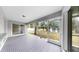 Relaxing screened patio with neutral paint and outdoor views perfect for enjoying the outdoors at 2675 Cherokee St, North Port, FL 34286