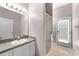 Simple bathroom with a walk-in shower and good lighting at 2808 Abbey Grove Dr, Valrico, FL 33594