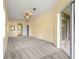 Spacious bedroom with a ceiling fan and an access to the screened lanai at 2808 Abbey Grove Dr, Valrico, FL 33594