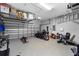 Spacious garage with epoxy floor, storage racks, and ample space for parking and hobbies at 2808 Abbey Grove Dr, Valrico, FL 33594