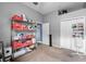 Well-organized storage room featuring shelving units with ample space for various items and two closets at 2808 Abbey Grove Dr, Valrico, FL 33594
