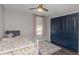 Cozy bedroom featuring a ceiling fan and soft, natural light with a comfortable bed and ample closet space at 3035 Annadale, Brandon, FL 33511