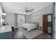 Bedroom featuring a ceiling fan, neutral walls, wooden floors and an exterior window at 3035 Annadale, Brandon, FL 33511