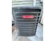 Close up of a grey Goodman central air conditioning unit at 3515 E 8Th Ave, Tampa, FL 33605