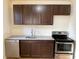 Bright kitchen features stainless steel appliances, granite countertops, and plenty of cabinet space at 3515 E 8Th Ave, Tampa, FL 33605
