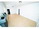 Bright living room featuring hardwood floors, neutral paint, and ample natural light at 3515 E 8Th Ave, Tampa, FL 33605