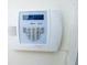 Honeywell security system interface mounted on the wall, ensuring safety at 3515 E 8Th Ave, Tampa, FL 33605