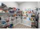 Spacious pantry with white wire shelving provides ample storage for food and household items at 35519 Bellington Blvd, Zephyrhills, FL 33541