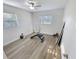 Versatile spare bedroom featuring ample natural light and wood flooring at 4715 W Chapin Ave, Tampa, FL 33611