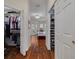Primary bedroom features hardwood floors, ample closet space, and French doors to a private outdoor patio at 4766 Royal Palm Ne Cir, St Petersburg, FL 33703