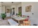 Comfortable outdoor seating area with a rustic table perfect for entertaining or relaxing outside at 4766 Royal Palm Ne Cir, St Petersburg, FL 33703