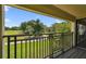 Relax on this balcony with decorative railings and views of the lush golf course at 4946 Mill Pond Rd # 3180, Wesley Chapel, FL 33543