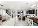 Spacious open-concept design with modern kitchen, living room, and dining area at 5014 Fallen Leaf Dr, Riverview, FL 33578