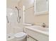 Bathroom features a shower, toilet, vanity, and mirrored medicine cabinet at 5623 80Th N St # 202, St Petersburg, FL 33709