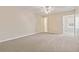 Cozy bedroom with neutral carpeting and natural light creating a peaceful retreat at 5623 80Th N St # 202, St Petersburg, FL 33709