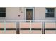 Balcony view of a condo building featuring the entrance to unit 202 at 5623 80Th N St # 202, St Petersburg, FL 33709