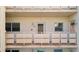Balcony view of a condo building featuring the entrance to unit 202 at 5623 80Th N St # 202, St Petersburg, FL 33709