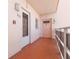 Exterior view of a condo building hallway with units 201 and 202 at 5623 80Th N St # 202, St Petersburg, FL 33709