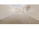 Bright, spacious living room with natural light and wall-to-wall carpeting at 5623 80Th N St # 202, St Petersburg, FL 33709