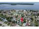 Aerial view of a neighborhood near the water, highlighting a property location with a red pin at 5920 Denver Ne St, St Petersburg, FL 33703