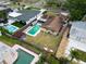 Aerial view of neighborhood featuring a backyard, pool and home and its location within the community at 5920 Denver Ne St, St Petersburg, FL 33703