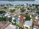 Aerial view of a property featuring a pool, boats, and a convenient location marked with a red pin at 5920 Denver Ne St, St Petersburg, FL 33703