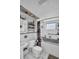 A full bathroom with a shower and cabinet at 5920 Denver Ne St, St Petersburg, FL 33703