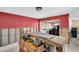 Dining room with sliding glass doors, view of pool and backyard at 5920 Denver Ne St, St Petersburg, FL 33703