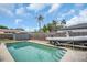 Tranquil pool surrounded by lush tropical landscaping at 5920 Denver Ne St, St Petersburg, FL 33703
