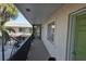 Condo building balcony with outdoor access at 614 Guild Dr # 15, Venice, FL 34285