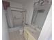 Standard bathroom with a shower-tub combo, vanity and tile flooring at 614 Guild Dr # 15, Venice, FL 34285