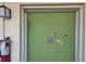 Condo entry door with unit number at 614 Guild Dr # 15, Venice, FL 34285