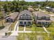 An aerial view of a charming home in a vibrant neighborhood, showcasing its curb appeal and surroundings at 710 W River Heights Ave, Tampa, FL 33603