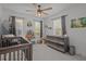 Charming Bedroom with a crib, dresser, and bookshelf, creating a warm and inviting space for a  at 710 W River Heights Ave, Tampa, FL 33603