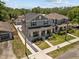 Lovely two-story home boasting a quaint front porch, well-kept lawn, and private driveway at 710 W River Heights Ave, Tampa, FL 33603