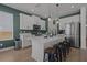 Spacious kitchen with a large island, modern appliances, and stylish cabinetry at 710 W River Heights Ave, Tampa, FL 33603