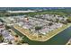 This aerial view showcases a well-maintained community with lush landscaping, serene lakes, and inviting residences at 732 Kensington Lake Cir, Brandon, FL 33511
