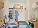 This storage closet with wire shelving features clothes, storage boxes and containers for organized space at 732 Kensington Lake Cir, Brandon, FL 33511