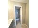 Bathroom featuring a vanity and doorway to a shower-tub combo at 7506 Presley Pl # 107, Tampa, FL 33617