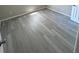 Bedroom with laminate flooring, neutral walls and white trim at 7506 Presley Pl # 107, Tampa, FL 33617